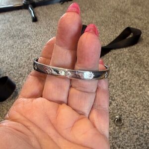 Silver Bangle Bracelet with Star Accents